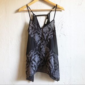 Sheer blouse with velvet floral detail